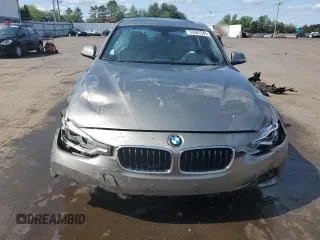 2018 BMW 3 Series 330i xDrive with VIN WBA8D9C54JEM33941, listed as a Copart auction lot 59501545 with 46,016 mi miles and Salvage title. Bid and sale history available at DreamBid. Image 5.