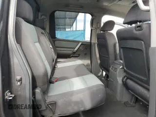 2005 Nissan Titan SE with VIN 1N6AA07B65N566082, listed as a Copart auction lot 80879174 with 215,297 mi miles and Clean Title. Bid and sale history available at carsss.com. Image 10.