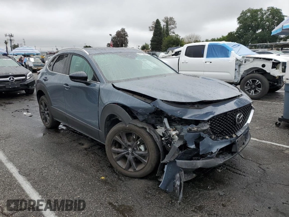 2023 Mazda CX-30 2.5 S Carbon Edition with VIN 3MVDMBCMXPM542809, listed as a Copart auction lot 51134315 with 21,279 mi miles and Salvage Title. Bid and sale history available at carsss.com. Image 4.