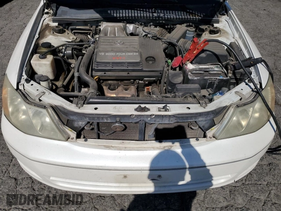 2000 Toyota Avalon XL z VIN 4T1BF28BXYU091688, wystawiony jako Copart lot #58162705 z przebiegiem 177 427 mil mil oraz Szkoda całkowita • Salvage title. Historia ofert i sprzedaży dostępna na DreamBid. Obrazek 11.