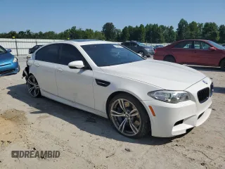 2014 BMW M5 with VIN WBSFV9C54ED097879, listed as a Copart auction lot 61380464 with 78,367 mi miles and Salvage Title. Bid and sale history available at carsss.com. Image 4.