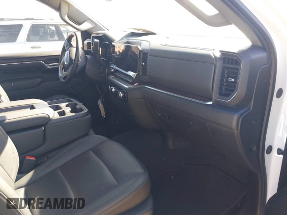 2024 GMC Sierra 1500 SLT with VIN 1GTPHDEDXRZ301250, listed as a IAAI auction lot 41445090 with 16,551 mi miles and . Bid and sale history available at DreamBid. Image 5.