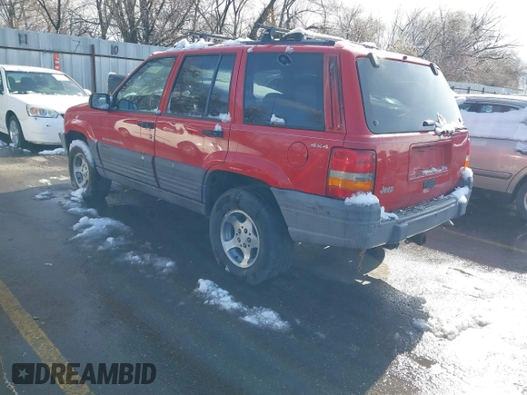 1996 Jeep Grand Cherokee Laredo with VIN 1J4GZ58Y8TC374929, listed as a IAAI auction lot 41725111 with 196,723 mi miles. Bid and sale history available at carsss.com. Image 3.