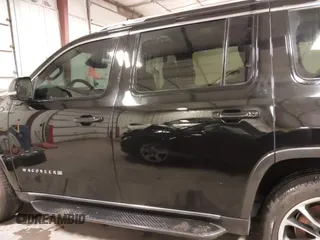 2022 Jeep Wagoneer Series II with VIN 1C4SJVBT5NS127476, listed as a IAAI auction lot 41807474 with 48,703 mi miles and . Bid and sale history available at DreamBid. Image 15.