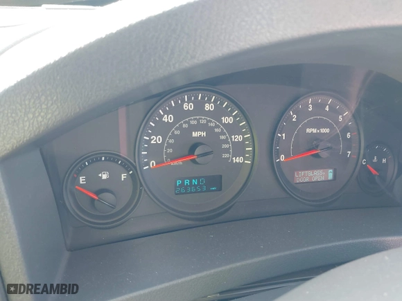 2005 Jeep Grand Cherokee Laredo with VIN 1J4GS48N75C505209, listed as a IAAI auction lot 41452637 with 263,653 mi miles. Bid and sale history available at carsss.com. Image 7.