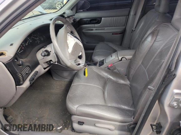 2002 Buick Regal GS с VIN 2G4WF551221293376, выставлен на аукционе Copart как лот 50914765 с пробегом Не указан миль и Списание • Salvage title. История ставок и продаж доступна на DreamBid. Изображение 7.