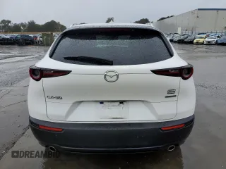 2021 Mazda CX-30 Premium with VIN 3MVDMADM4MM217643, listed as a Copart auction lot 45041145 with 27,774 mi miles and Salvage title. Bid and sale history available at DreamBid. Image 6.