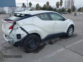 2021 Toyota C-HR LE with VIN JTNKHMBX1M1098521, listed as a IAAI auction lot 41539775 with 14,840 mi miles. Bid and sale history available at carsss.com. Image 4.