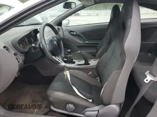 2000 Toyota Celica GT with VIN JTDDR32T9Y0037253, listed as a Copart auction lot 58602215 with Not provided miles and Salvage title. Bid and sale history available at DreamBid. Image 7.