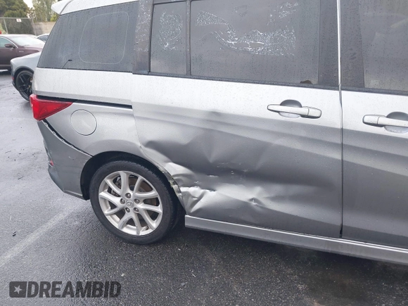 2012 Mazda 5 Touring с VIN JM1CW2CLXC0126576, выставлен на аукционе IAAI как лот 41759917 с пробегом 144 596 миль миль и . История ставок и продаж доступна на DreamBid. Изображение 6.