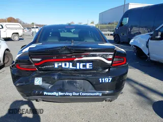 2022 Dodge Charger Police with VIN 2C3CDXAT3NH109952, listed as a IAAI auction lot 40919989 with 19,169 mi miles and . Bid and sale history available at DreamBid. Image 16.