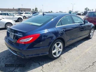 2014 Mercedes-Benz CLS 550 with VIN WDDLJ9BB9EA090821, listed as a IAAI auction lot 42582082 with 97,459 mi miles and . Bid and sale history available at DreamBid. Image 4.