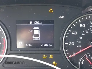 2019 Kia Optima LX z VIN 5XXGT4L38KG319215, wystawiony jako IAAI lot #42226251 z przebiegiem 70 449 mil mil oraz . Historia ofert i sprzedaży dostępna na DreamBid. Obrazek 7.