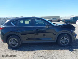 2017 Mazda CX-5 Sport with VIN JM3KFBBL2H0144792, listed as a IAAI auction lot 41654031 with 77,107 mi miles. Bid and sale history available at carsss.com. Image 13.