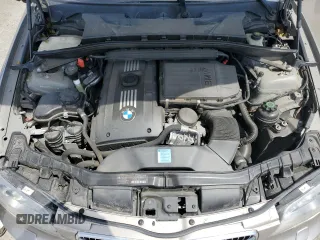 2010 BMW 1 Series 135i with VIN WBAUN9C55AVK41973, listed as a Copart auction lot 54609015 with 144,685 mi miles and Salvage Title. Bid and sale history available at carsss.com. Image 11.