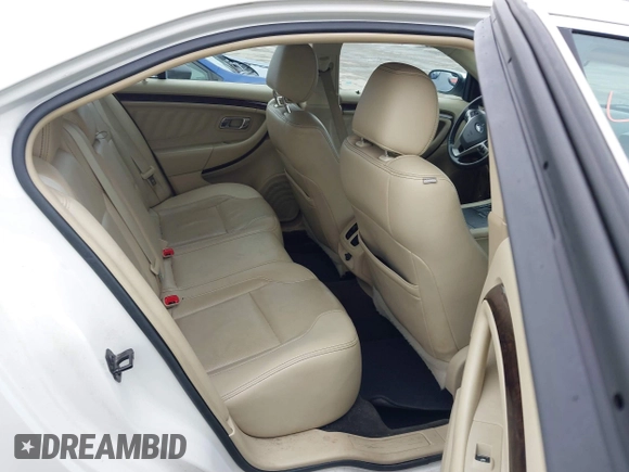2015 Ford Taurus Limited with VIN 1FAHP2F85FG117635, listed as a IAAI auction lot 41979311 with 104,314 mi miles. Bid and sale history available at carsss.com. Image 8.