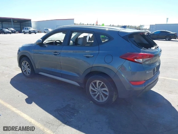 2018 Hyundai Tucson SEL with VIN KM8J3CA48JU718402, listed as a IAAI auction lot 41810363 with 218,853 mi miles. Bid and sale history available at carsss.com. Image 3.