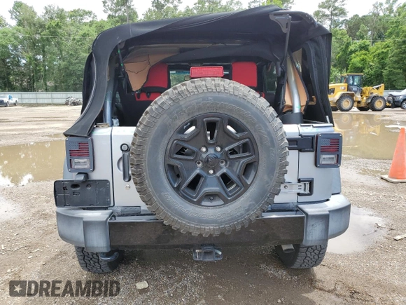 2016 Jeep Wrangler Unlimited Sport with VIN 1C4BJWDG8GL346676, listed as a Copart auction lot 57972665 with 57,515 mi miles and Salvage title. Bid and sale history available at DreamBid. Image 6.