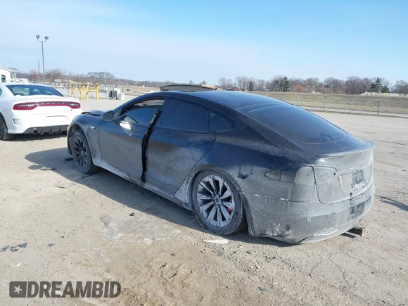 2016 Tesla Model S 90D with VIN 5YJSA1E42GF143731, listed as a IAAI auction lot 41394839 with Not provided miles and . Bid and sale history available at DreamBid. Image 3.