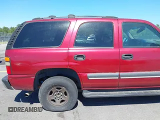 2004 Chevrolet Tahoe LS with VIN 1GNEC13Z74R207698, listed as a IAAI auction lot 42310462 with 255,218 mi miles and . Bid and sale history available at DreamBid. Image 13.
