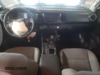 2023 Toyota Tacoma SR z VIN 3TYRZ5CN0PT032427, wystawiony jako Copart lot #87620985 z przebiegiem 32 010 mil mil oraz Szkoda całkowita • Salvage title. Historia ofert i sprzedaży dostępna na DreamBid. Obrazek 8.