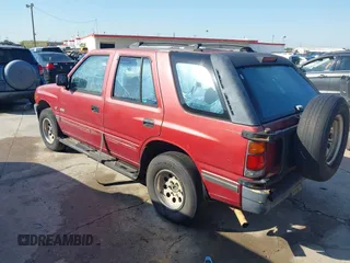 1994 Isuzu Rodeo LS z VIN 4S2CG58VXR4327327, wystawiony jako IAAI lot #41959576 z przebiegiem 169 794 mil mil oraz . Historia ofert i sprzedaży dostępna na DreamBid. Obrazek 3.