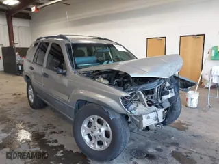 2001 Jeep Grand Cherokee Laredo with VIN 1J4GW48S01C732942, listed as a IAAI auction lot 41988918 with 205,752 mi miles. Bid and sale history available at carsss.com. Image 1.