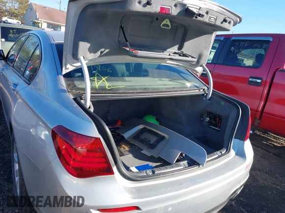 2014 BMW 7 Series 740i with VIN WBAYA6C54ED144450, listed as a IAAI auction lot 41680060 with 999,999 mi miles. Bid and sale history available at carsss.com. Image 6.