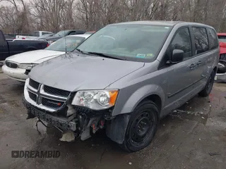 2014 Dodge Grand Caravan American Value with VIN 2C4RDGBG9ER187198, listed as a IAAI auction lot 41669334 with 204,803 mi miles and . Bid and sale history available at DreamBid. Image 2.