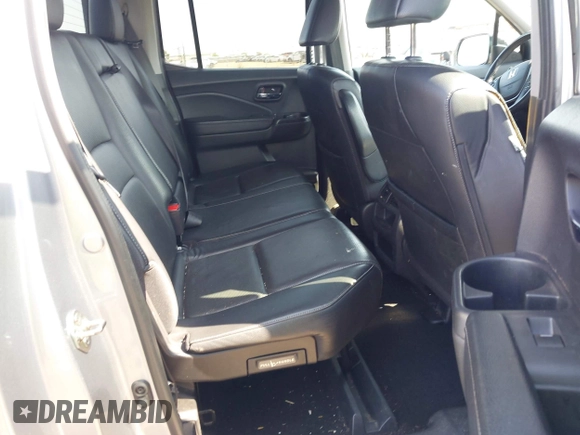 2019 Honda Ridgeline RTL-E with VIN 5FPYK3F79KB029771, listed as a IAAI auction lot 42448369 with 90,142 mi miles and . Bid and sale history available at DreamBid. Image 8.