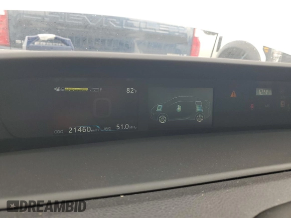 2021 Toyota Prius L Eco с VIN JTDKAMFU5M3142128, выставлен на аукционе Copart как лот 73832324 с пробегом 21 460 миль миль и Списание • Salvage title. История ставок и продаж доступна на DreamBid. Изображение 9.