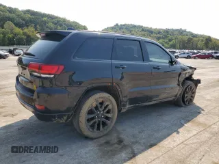 2018 Jeep Grand Cherokee Laredo E with VIN 1C4RJFAG9JC390597, listed as a Copart auction lot 71450474 with 69,645 mi miles and Salvage title. Bid and sale history available at DreamBid. Image 3.