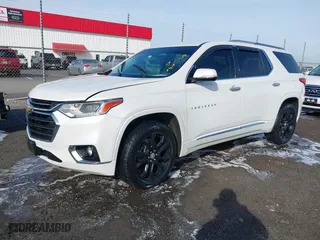 2018 Chevrolet Traverse Premier with VIN 1GNERKKW1JJ128646, listed as a IAAI auction lot 41423966 with 130,078 mi miles. Bid and sale history available at carsss.com. Image 2.