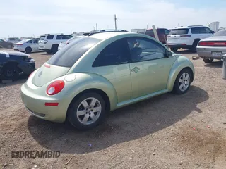 2007 Volkswagen New Beetle Coupe with VIN 3VWPW31C67M521767, listed as a IAAI auction lot 41687893 with 148,312 mi miles. Bid and sale history available at carsss.com. Image 4.