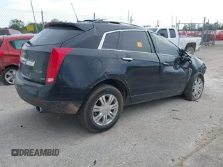 2016 Cadillac SRX Luxury Collection with VIN 3GYFNEE39GS570748, listed as a IAAI auction lot 42255564 with 130,980 mi miles and . Bid and sale history available at DreamBid. Image 4.