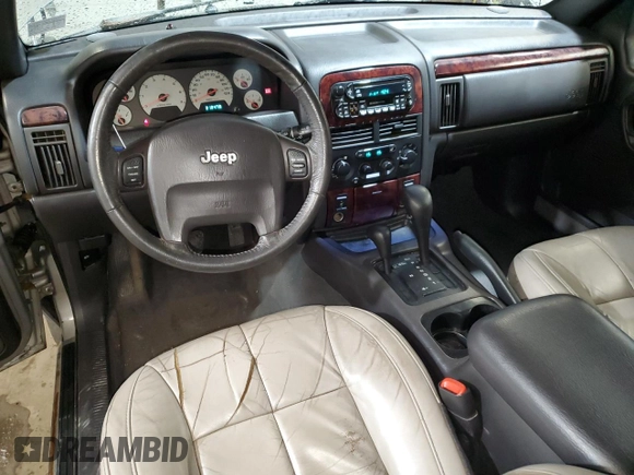 2001 Jeep Grand Cherokee Limited with VIN 1J4GW58N91C664611, listed as a Copart auction lot 53330755 with 212,479 mi miles and Salvage Title. Bid and sale history available at carsss.com. Image 8.
