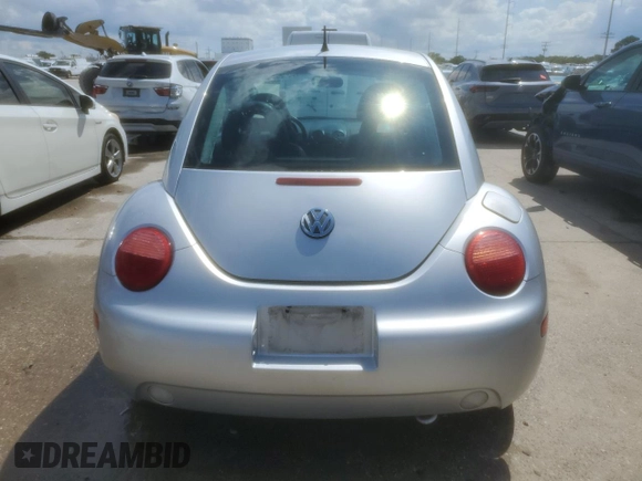2002 Volkswagen Beetle GLS with VIN 3VWCB21C32M410168, listed as a Copart auction lot 55098545 with 166,410 mi miles and Salvage title. Bid and sale history available at DreamBid. Image 6.
