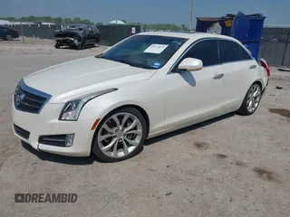 2013 Cadillac ATS Premium z VIN 1G6AE5S35D0129175, wystawiony jako IAAI lot #42037872 z przebiegiem 95 747 mil mil oraz . Historia ofert i sprzedaży dostępna na DreamBid. Obrazek 2.