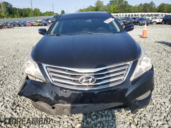 2013 Hyundai Azera с VIN KMHFH4JG2DA266282, выставлен на аукционе Copart как лот 59156175 с пробегом 135 013 миль миль и Списание • Salvage title. История ставок и продаж доступна на DreamBid. Изображение 5.