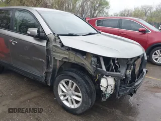 2014 Kia Sorento LX with VIN 5XYKT3A67EG477367, listed as a IAAI auction lot 41911249 with 172,320 mi miles and . Bid and sale history available at DreamBid. Image 6.
