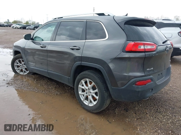 2014 Jeep Cherokee Altitude with VIN 1C4PJMCB2EW181848, listed as a IAAI auction lot 41638004 with 175,813 mi miles. Bid and sale history available at carsss.com. Image 3.