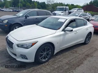 2015 Infiniti Q50 Premium with VIN JN1BV7AR5FM390985, listed as a IAAI auction lot 42641031 with 117,060 mi miles and . Bid and sale history available at DreamBid. Image 17.