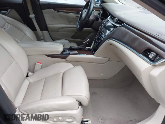 2014 Cadillac XTS Luxury z VIN 2G61N5S38E9292684, wystawiony jako IAAI lot #41842596 z przebiegiem 130 318 mil mil oraz . Historia ofert i sprzedaży dostępna na DreamBid. Obrazek 5.