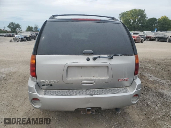 2005 GMC Envoy SLT with VIN 1GKDT13S852330514, listed as a Copart auction lot 71190504 with 203,616 mi miles and Salvage Title. Bid and sale history available at carsss.com. Image 6.