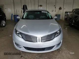 2015 Lincoln MKZ z VIN 3LN6L2GK4FR613117, wystawiony jako Copart lot #54141735 z przebiegiem 129 072 mil mil oraz Szkoda całkowita • Salvage title. Historia ofert i sprzedaży dostępna na DreamBid. Obrazek 5.