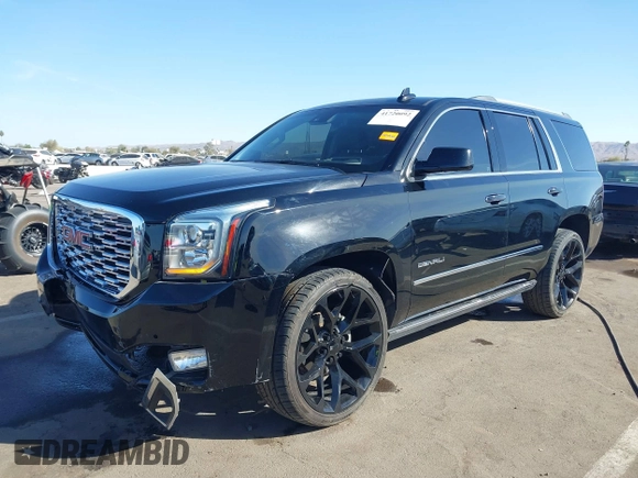2018 GMC Yukon Denali with VIN 1GKS1CKJ1JR110344, listed as a IAAI auction lot 41720092 with 82,296 mi miles. Bid and sale history available at carsss.com. Image 17.