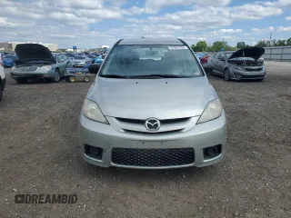 2006 Mazda 5 Touring with VIN JM1CR293760119250, listed as a Copart auction lot 57667325 with 121,226 mi miles and Salvage title. Bid and sale history available at DreamBid. Image 5.