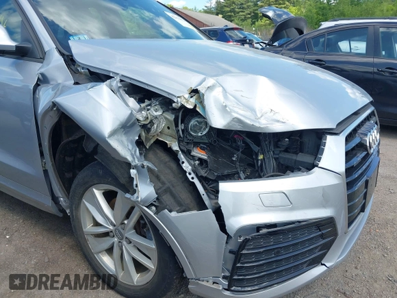 2018 Audi Q3 Premium with VIN WA1ECCFS0JR022112, listed as a IAAI auction lot 42356014 with 56,671 mi miles and . Bid and sale history available at DreamBid. Image 6.