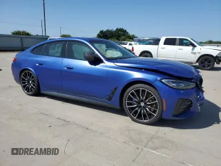 2023 BMW i4 M50 with VIN WBY33AW07PFN73257, listed as a Copart auction lot 53394614 with 10,216 mi miles and Salvage Title. Bid and sale history available at carsss.com. Image 4.