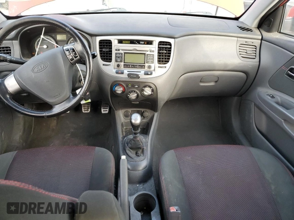 2009 Kia Rio LX with VIN KNADE243X96587429, listed as a Copart auction lot 46500825 with 116,557 mi miles and Salvage Title. Bid and sale history available at carsss.com. Image 8.